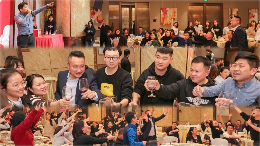 Joyful annual dinner with happy moments, prize draws, and group celebration